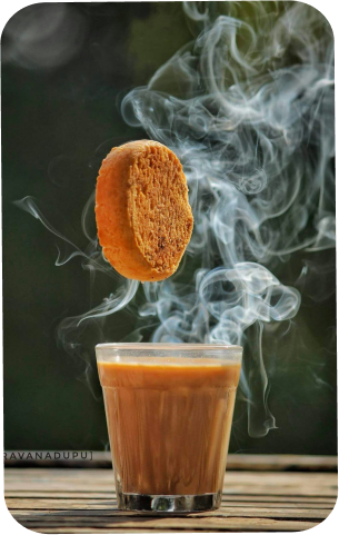Fresh chai in a glass with steam